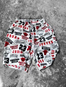 Мужские Летние Трикотажные Шорты Белые с Принтами "Chikago Bulls - Jordan"