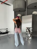Женские Голубые Рваные Джинсы Трубы с Красным Напылением