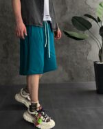 Мужские Удлиненные Базовые Зеленые Шорты Свободного Кроя с Необработанным Низом
